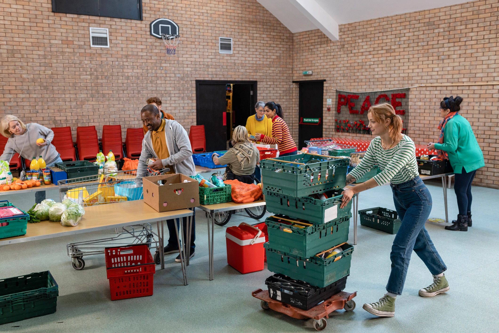 Volunteers organizing donations in a community ministry setting