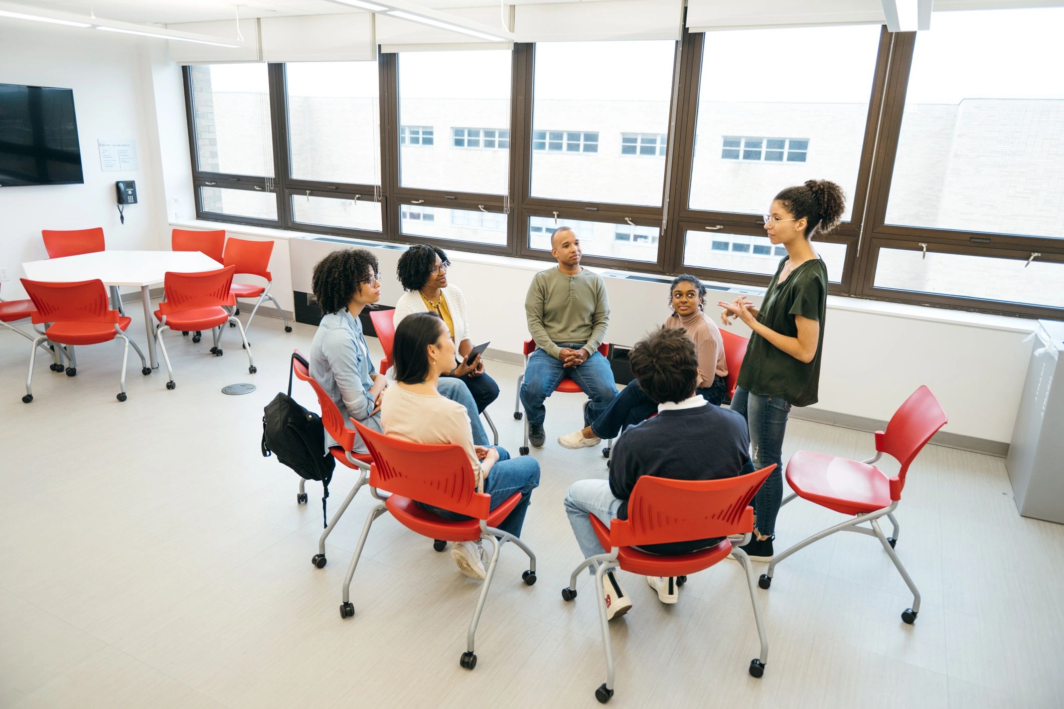 Support group meeting in a caring community setting